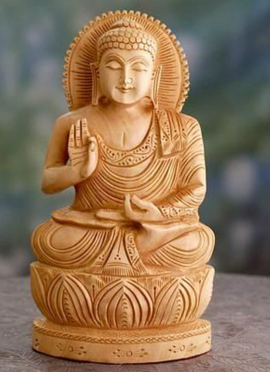 Wooden hand carved buddha statue